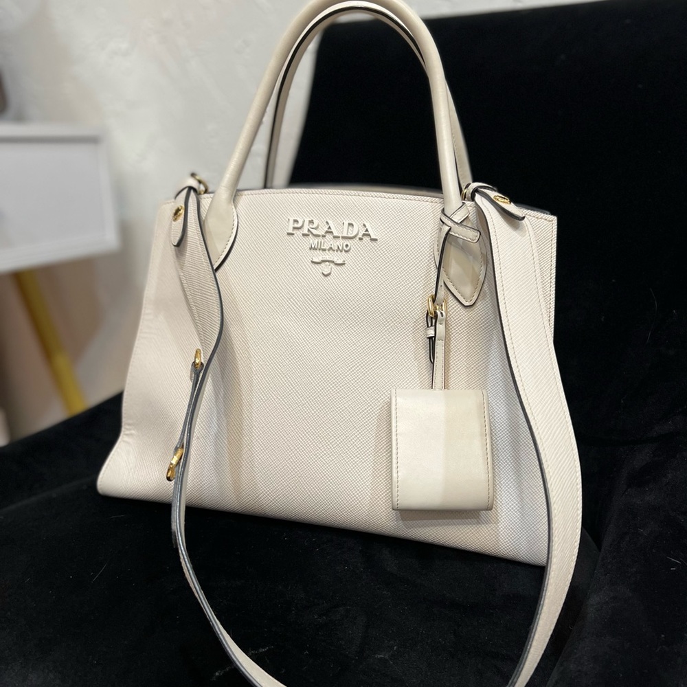 COPY - Prada Tote
White Leather
Gold-Tone Hardware
Rolled Handles
Logo Jacquard…